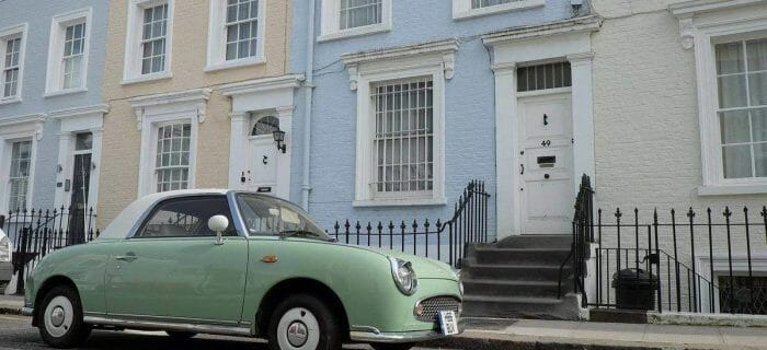 pastel coloured houses to signify unexpected expenses
